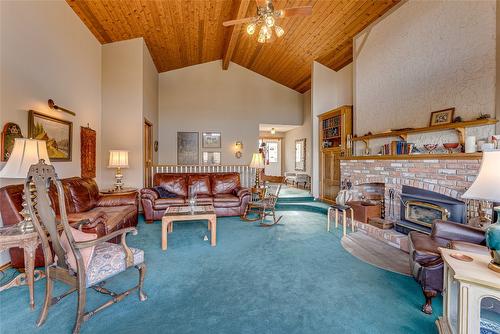 14114 Juniper Drive, Coldstream, BC - Indoor Photo Showing Living Room With Fireplace