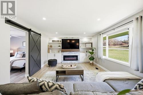 3810 Burnham Street N, Hamilton Township, ON - Indoor Photo Showing Living Room With Fireplace