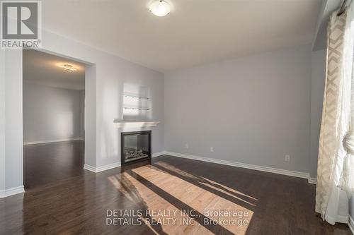 303 Bobolink Ridge, Ottawa, ON - Indoor Photo Showing Living Room With Fireplace