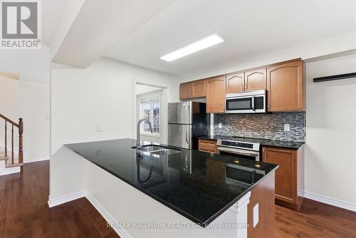 granite countertops - 1875 Maple Grove Road, Ottawa, ON - Indoor Photo Showing Kitchen With Double Sink