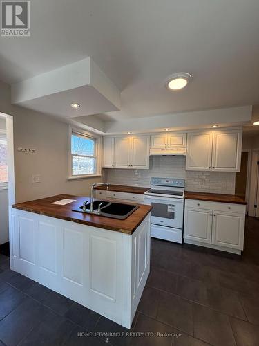 11 Garnet Street, St. Catharines, ON - Indoor Photo Showing Kitchen With Double Sink