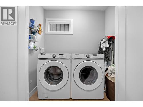 Laundry closet- 2nd floor - 1435 Cara Glen Court Unit# 119, Kelowna, BC - Indoor Photo Showing Laundry Room