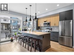 Open Concept  Kitchen with Island seating - main floor - 