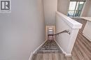 Stairs with wood finished floors and baseboards - 118 Gravel Ridge Trail Unit# C17, Kitchener, ON  - Indoor Photo Showing Other Room 