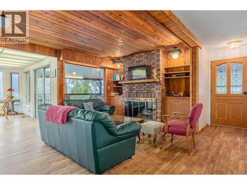 2071 Massie Road, Christina Lake, BC - Indoor Photo Showing Living Room With Fireplace