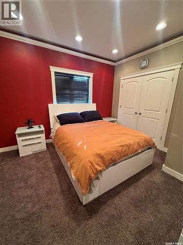916 3Rd Street Se, Weyburn, SK - Indoor Photo Showing Bedroom