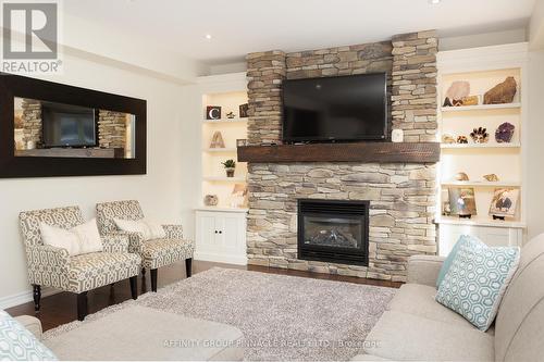 31 Ellis Crescent, Kawartha Lakes (Lindsay), ON - Indoor Photo Showing Living Room With Fireplace