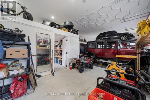 3 car garage with storage room and loft - 88 Bridge Street, Prince Edward County (Picton Ward), ON - Indoor Photo Showing Garage
