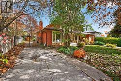 2nd driveway with gate to side of home. - 