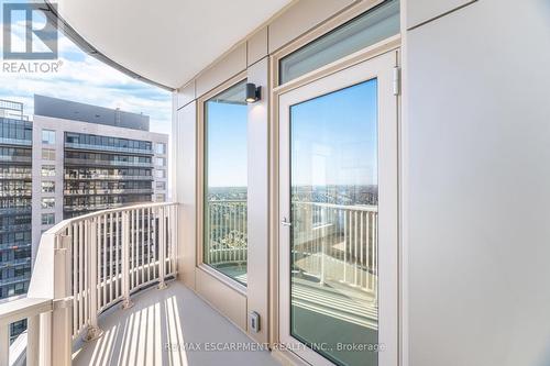 1901 - 3240 William Coltson Avenue, Oakville, ON -  With Exterior