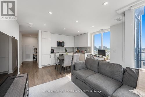 604 - 297 Oak Walk Drive, Oakville, ON - Indoor Photo Showing Living Room