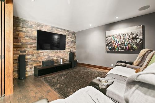 Cinéma maison - 200 Rue Des Loisirs, Entrelacs, QC - Indoor Photo Showing Living Room With Fireplace
