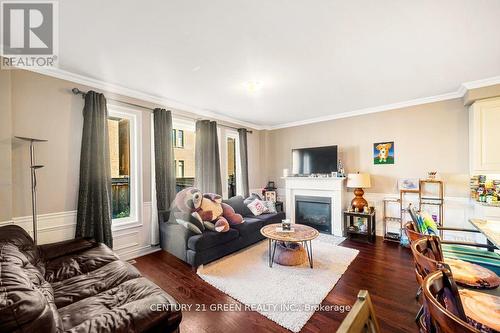 9 Coates Of Arms Lane N, Ajax, ON - Indoor Photo Showing Living Room With Fireplace