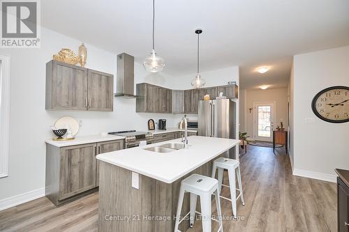 Modern kitchen with loads of storage space - 394 Hummel Crescent, Fort Erie (Lakeshore), ON - Indoor Photo Showing Kitchen With Stainless Steel Kitchen With Double Sink With Upgraded Kitchen