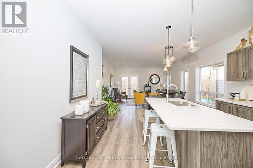 Open concept ktichen, dining room, and living room - 394 Hummel Crescent, Fort Erie (Lakeshore), ON - Indoor Photo Showing Kitchen With Double Sink