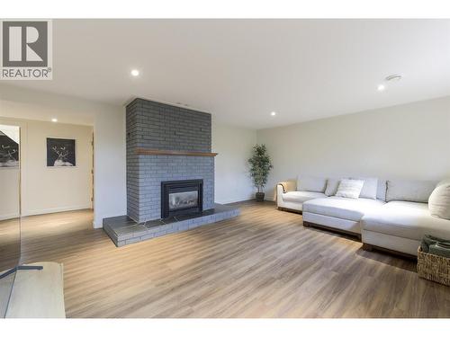 3153 Hall Road, Kelowna, BC - Indoor Photo Showing Living Room With Fireplace
