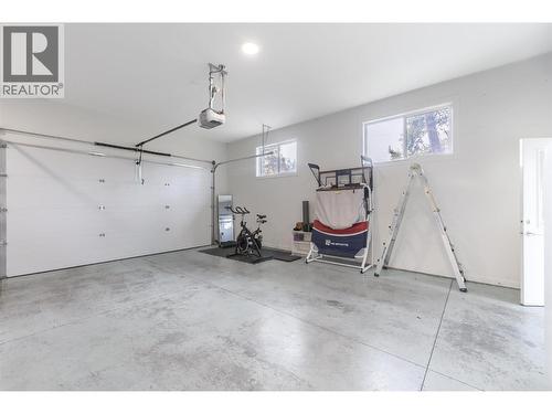 Heated garage/Potential suite - 3153 Hall Road, Kelowna, BC - Indoor Photo Showing Garage