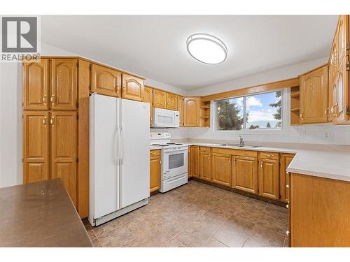1055 Lawrence Avenue Unit# 210, Kelowna, BC - Indoor Photo Showing Kitchen With Double Sink