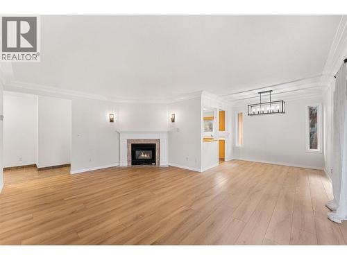 1055 Lawrence Avenue Unit# 210, Kelowna, BC - Indoor Photo Showing Living Room With Fireplace