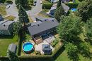 Backyard - 15 Rue Louis-Liénard-De-Beaujeu, Saint-Jean-Sur-Richelieu, QC  - Outdoor With Above Ground Pool With View 