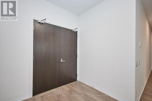 double door condo entry - 1001 - 7711 Green Vista Gate, Niagara Falls (Oldfield), ON - Indoor Photo Showing Other Room