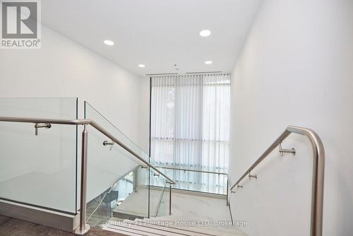 stairs to grand lobby - 1001 - 7711 Green Vista Gate, Niagara Falls (Oldfield), ON - Indoor Photo Showing Other Room