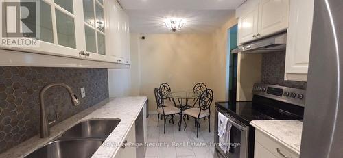 805 - 2556 Argyle Road, Mississauga, ON - Indoor Photo Showing Kitchen With Double Sink