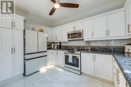 1436 Gulledge Trail, Oakville (Wt West Oak Trails), ON - Indoor Photo Showing Kitchen With Double Sink