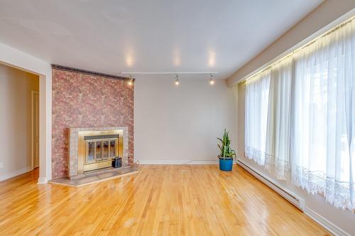 Living room - 605 Rue Kléber, Laval (Duvernay), QC - Indoor With Fireplace