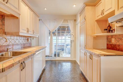 Kitchen - 605 Rue Kléber, Laval (Duvernay), QC - Indoor Photo Showing Kitchen With Double Sink