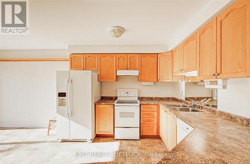 569 Garbutt Terrace, Peterborough (Northcrest Ward 5), ON - Indoor Photo Showing Kitchen With Double Sink