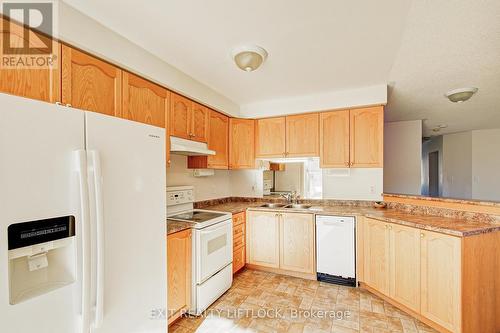 569 Garbutt Terrace, Peterborough (Northcrest Ward 5), ON - Indoor Photo Showing Kitchen With Double Sink