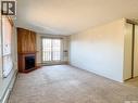 305 1110 9Th Avenue Ne, Swift Current, SK  - Indoor With Fireplace 
