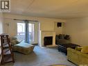 204 463 Pendygrasse Road, Saskatoon, SK  - Indoor Photo Showing Other Room With Fireplace 