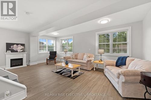 425 King Street W, Gananoque, ON - Indoor Photo Showing Living Room With Fireplace