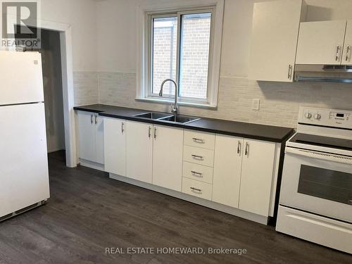 322 Cosburn Avenue, Toronto, ON - Indoor Photo Showing Kitchen With Double Sink