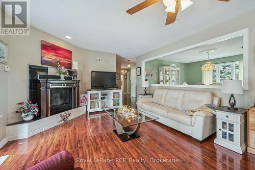2 Murray Way, Minto, ON - Indoor Photo Showing Living Room With Fireplace