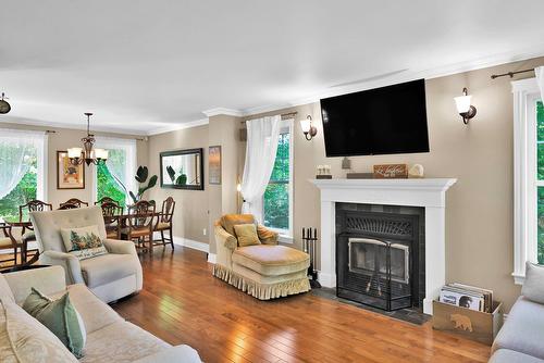 Living room - 1209 Rue Mathieu, Prévost, QC - Indoor Photo Showing Living Room With Fireplace