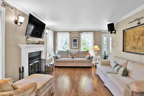 Living room - 1209 Rue Mathieu, Prévost, QC - Indoor Photo Showing Living Room With Fireplace