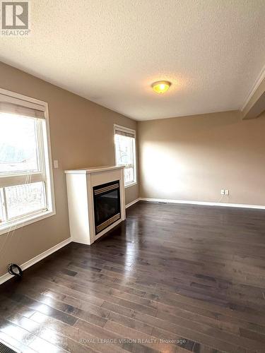 594 Flagstone Court, Oshawa, ON - Indoor Photo Showing Living Room With Fireplace
