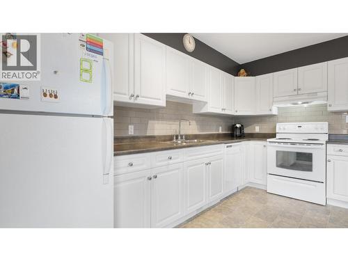 200 Black Forest Trail Unit# 501, Invermere, BC - Indoor Photo Showing Kitchen With Double Sink