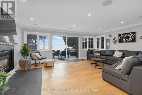 943 Barry Avenue, Innisfil, ON - Indoor Photo Showing Living Room With Fireplace