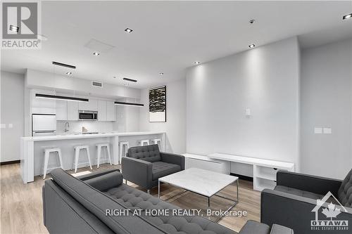 708 - 203 Catherine St Street, Ottawa, ON - Indoor Photo Showing Living Room