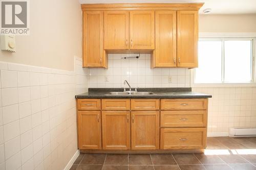 84 Wallace Ter, Sault Ste. Marie, ON - Indoor Photo Showing Kitchen With Double Sink