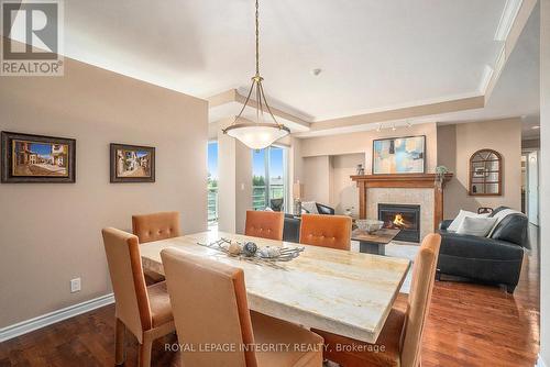704 - 136 Darlington Private, Ottawa, ON - Indoor Photo Showing Dining Room With Fireplace
