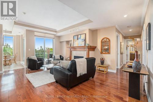 704 - 136 Darlington Private, Ottawa, ON - Indoor Photo Showing Living Room With Fireplace