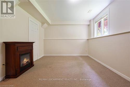 P87 - 175 David Bergey Drive, Kitchener, ON - Indoor Photo Showing Other Room With Fireplace
