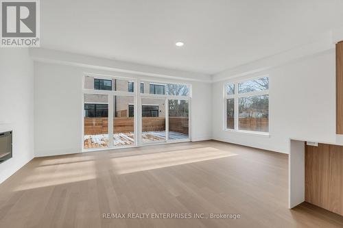 76 - 50 Lou Parsons Way, Mississauga, ON - Indoor With Fireplace