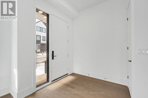 76 - 50 Lou Parsons Way, Mississauga, ON - Indoor Photo Showing Other Room With Fireplace