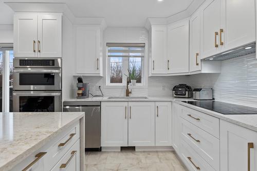 Cuisine - 2345 Rue Du Passerin, Laval (Sainte-Rose), QC - Indoor Photo Showing Kitchen